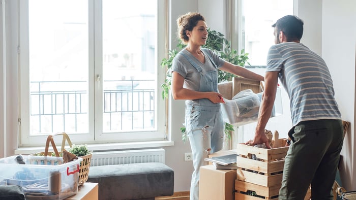 Couple renting first apartment together and moving in
