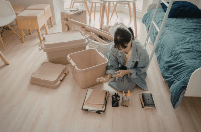 Woman taking advantage of local household storage solutions