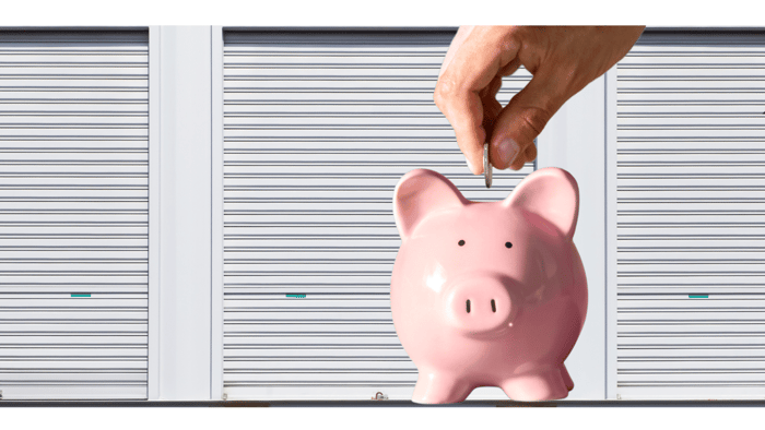 Hand placing money into a piggy bank to represent bait-and-switch teaser rates in storage