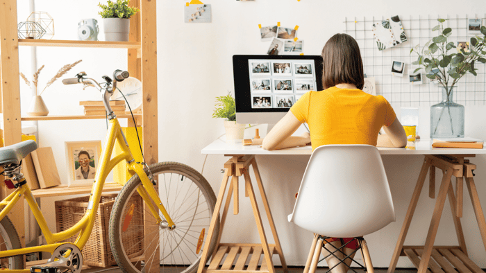 Woman organizing a compact apartment while transforming small spaces