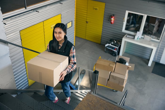 How to pack a self storage unit with organized boxes at an indoor storage facility