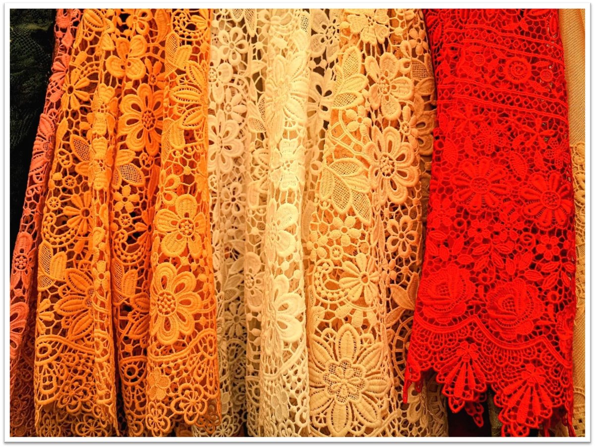 Look for stable lace fabrics like Guipure Lace, which has no mesh base but features strong thread-linked patterns—ideal for structured or form-fitting apparel.