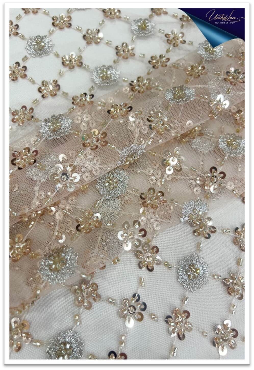 A modern interpretation of classic lace, Sheer Metallic Lace features threads with a reflective shimmer subtly woven into a sheer base.