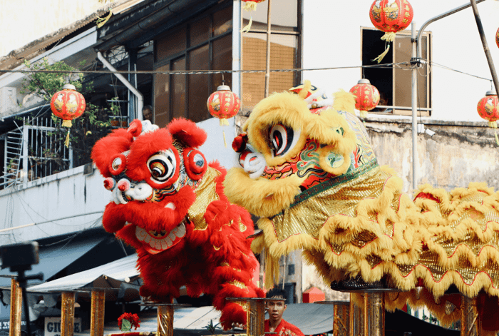 Seen These Yellow and Red Flags All Over Thailand? Your Guide to the "Kin Je" Vegetarian Festival.
