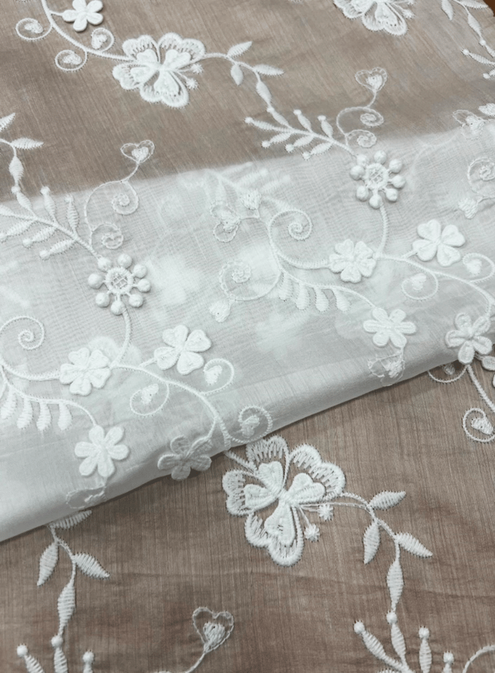 Cotton remains an excellent choice for traditional garments, casual wear, and designs where cost-effectiveness is a priority. It pairs well with lace characteristics