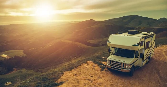 RV Storage in Folsom - RV overlooking mountains and sunset