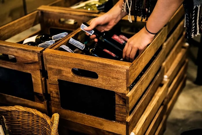 Bottles of Wine Stored in Crates