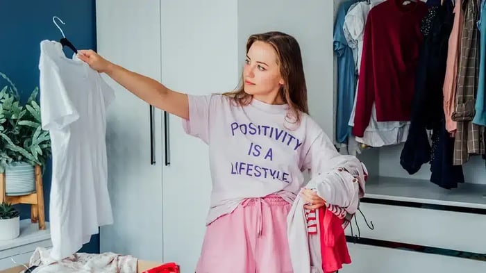 woman sorting clothes