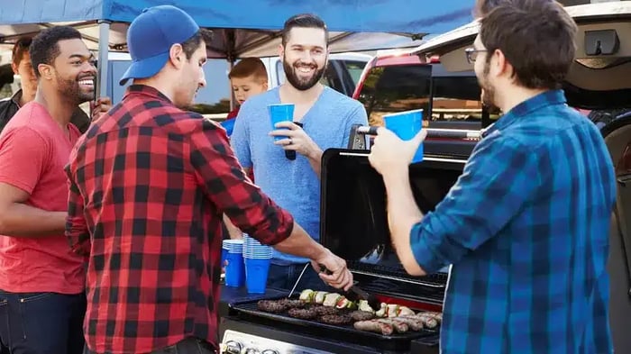 people using a grill that will later be stored