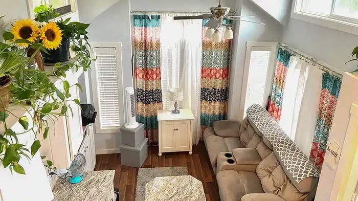 A living room with colorful curtains