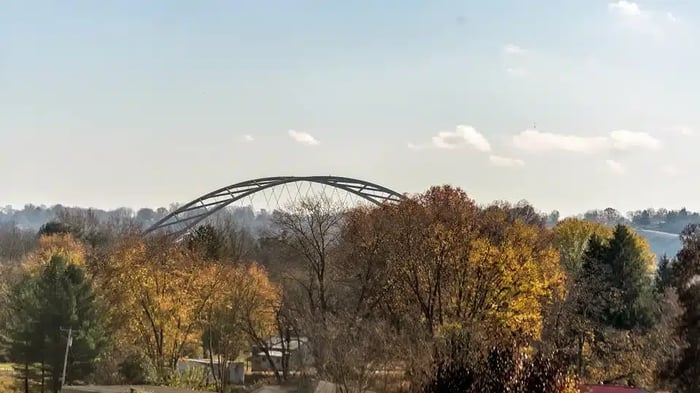 a forest with a bridge in the background near Belpre, OH