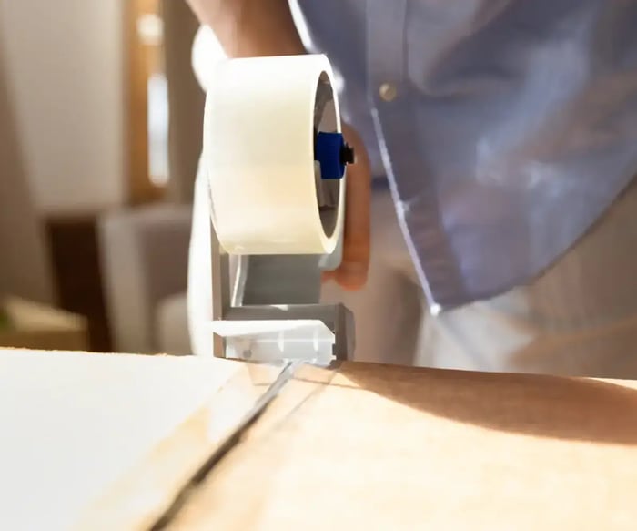 close up of a box and packing tape