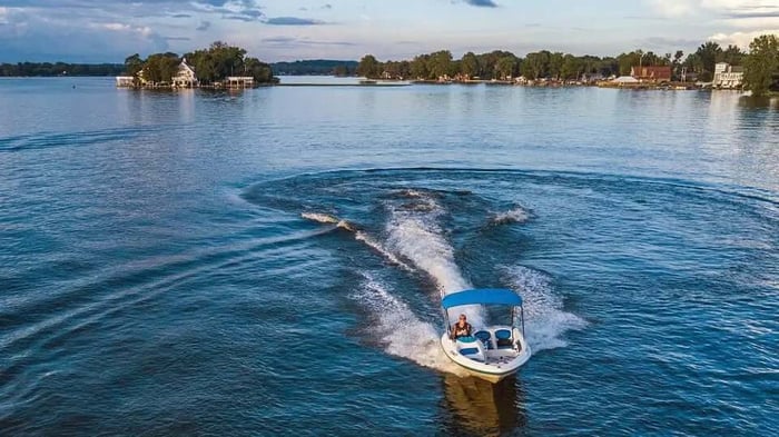 a person boating on a lake