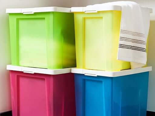 A stack of multi-coloured storage bins