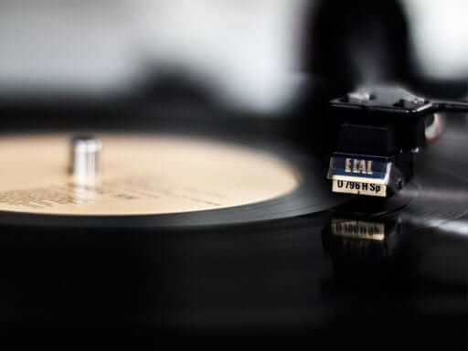 A closeup of a vinyl record spinning