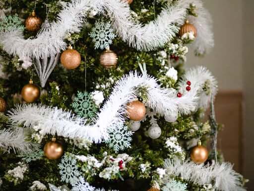 Decorated Christmas tree with cold ornaments and snowflakes