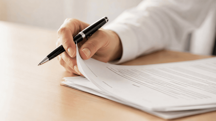 Person reviewing and signing a storage rental agreement