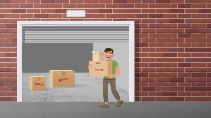 person moving boxes