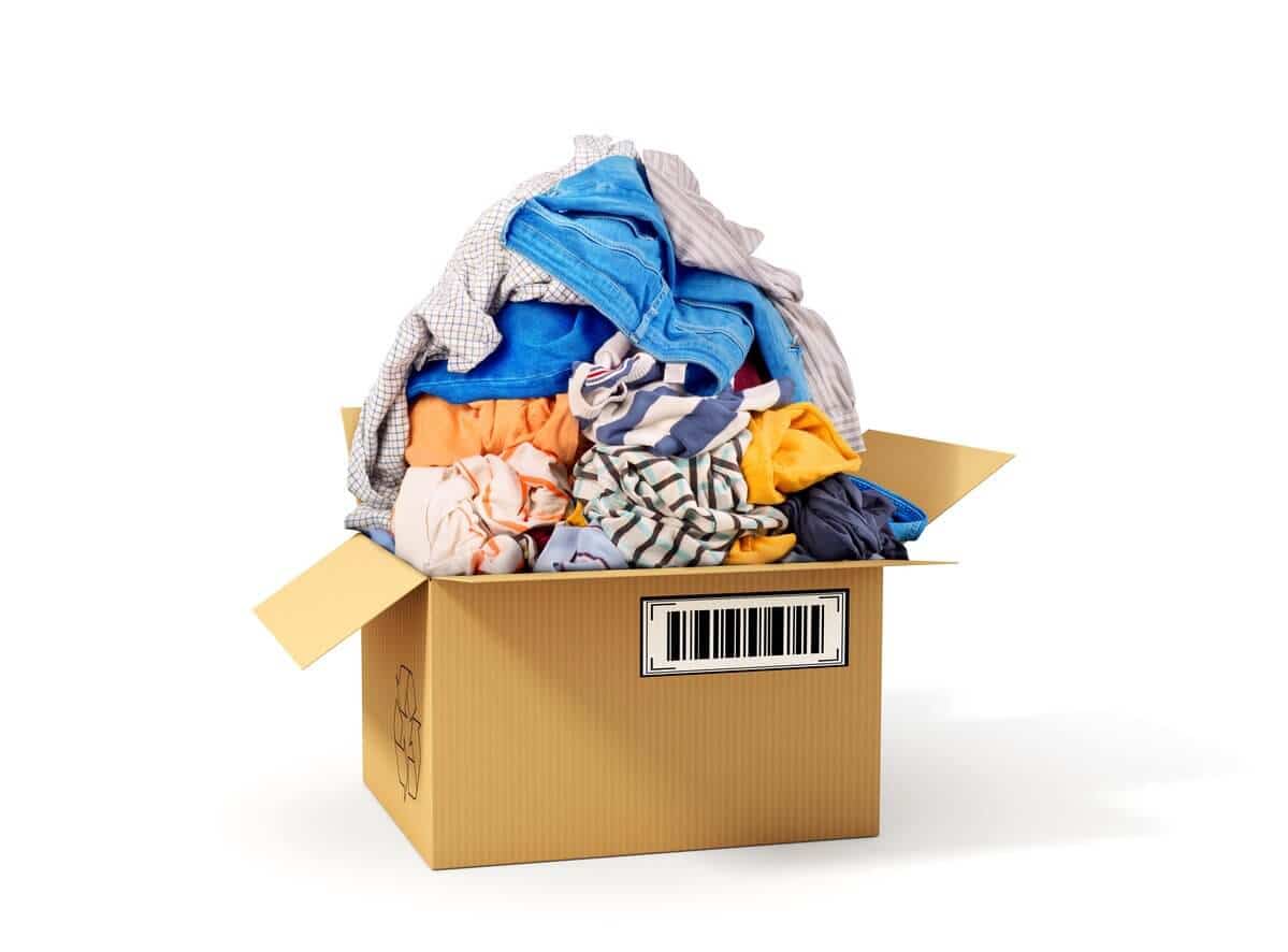 A cardboard box filled with fall clothing is ready for storage units in Winston-Salem, NC