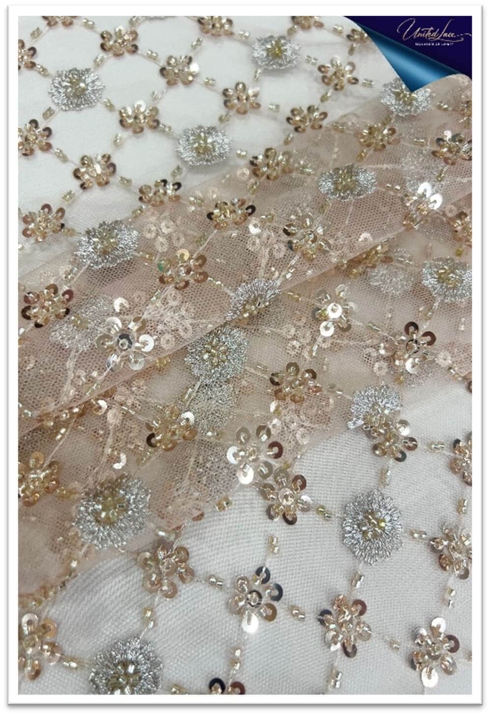 A modern interpretation of classic lace, Sheer Metallic Lace features threads with a reflective shimmer subtly woven into a sheer base.